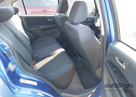 2013 Suzuki Sx4 Le/Le Popular z USA, uszkodzony, nr VIN JS2YC5A37D6100542